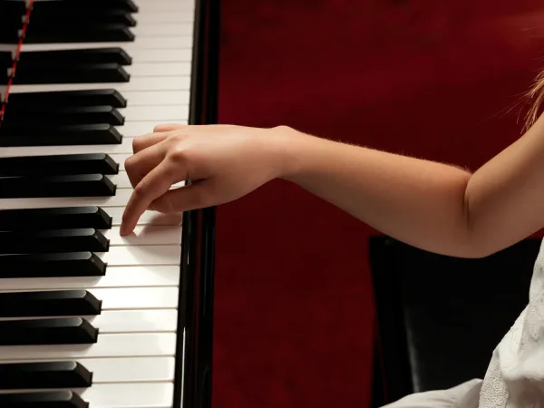Child playing piano