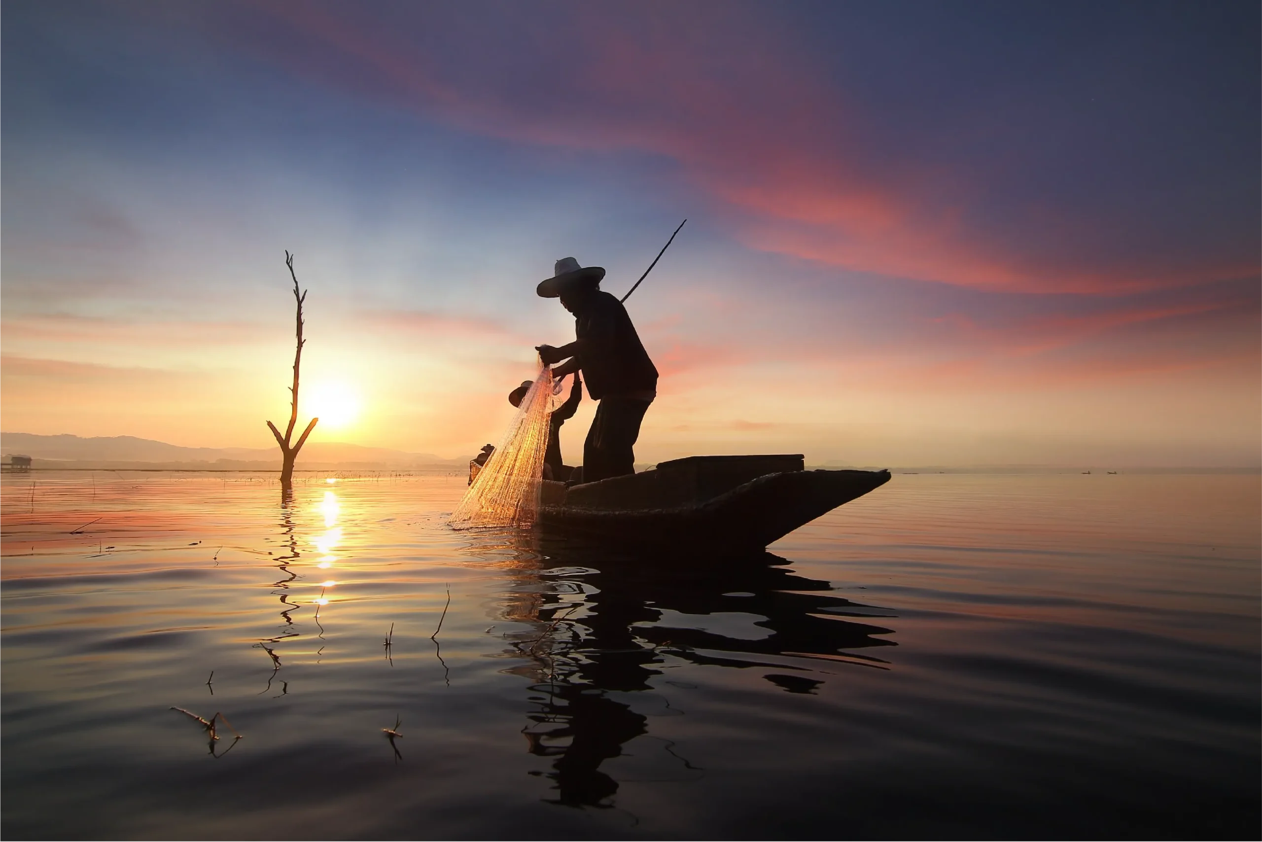 Silhouette of fisherman